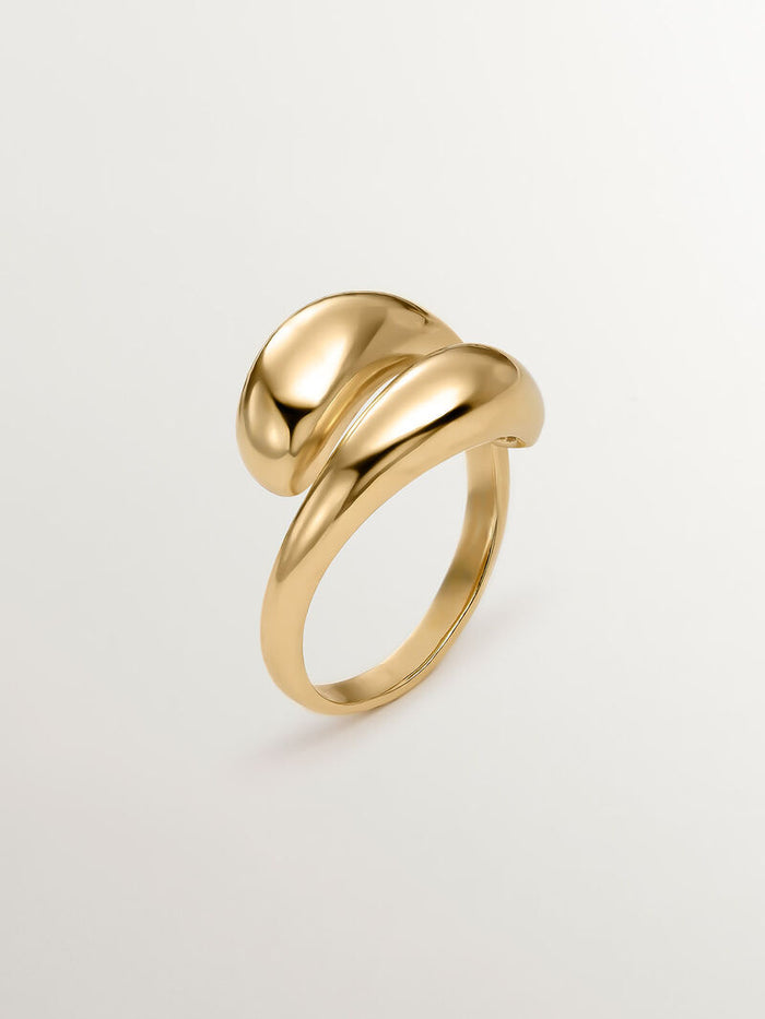 Anillo abombado espiral de plata bañada en oro amarillo de 18kt