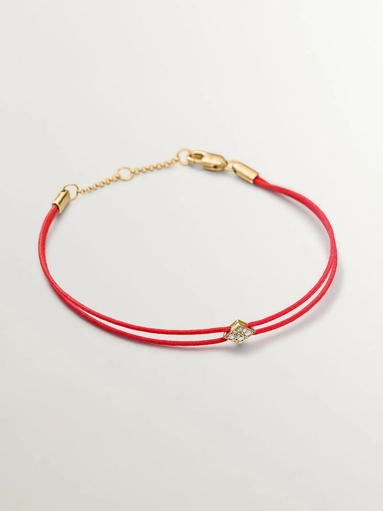 Pulsera de hilo y oro amarillo de 18K con diamantes