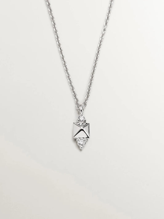 Colgante de oro blanco de 18K con tachuela y diamante