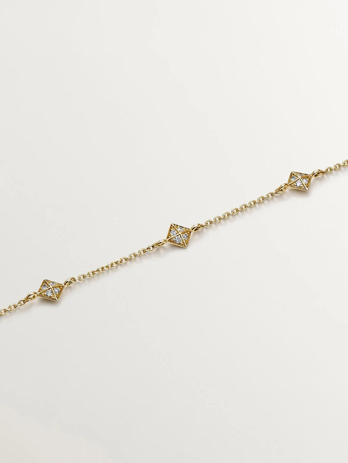 Pulsera de oro amarillo de 18K con formas geométricas y diamantes