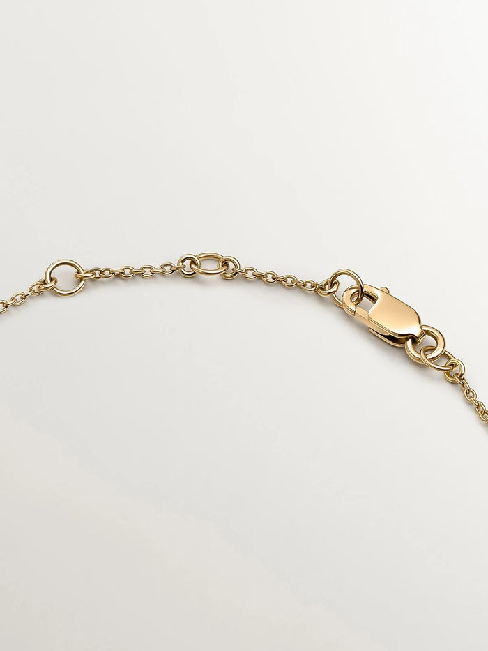 Pulsera de oro amarillo de 18K con formas geométricas y diamantes