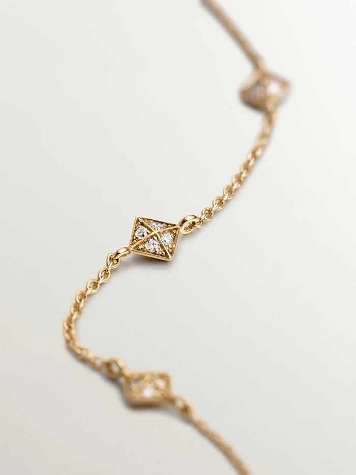 Pulsera de oro amarillo de 18K con formas geométricas y diamantes