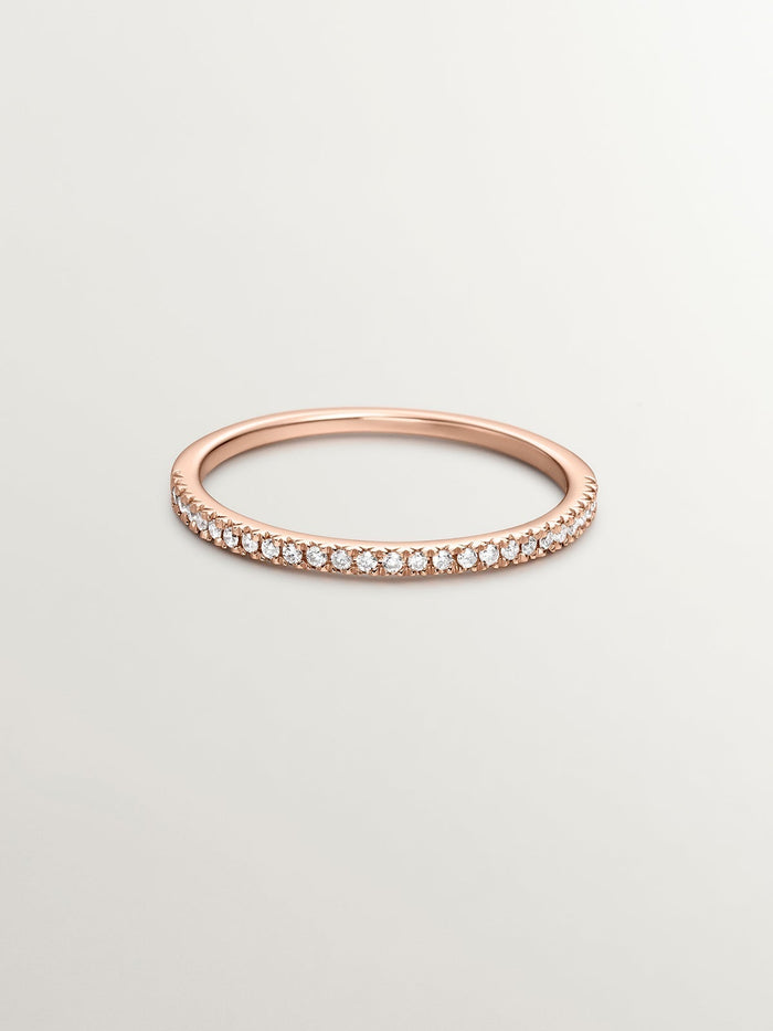 Anillo con halo de diamantes en oro rosa de 0,09 ct