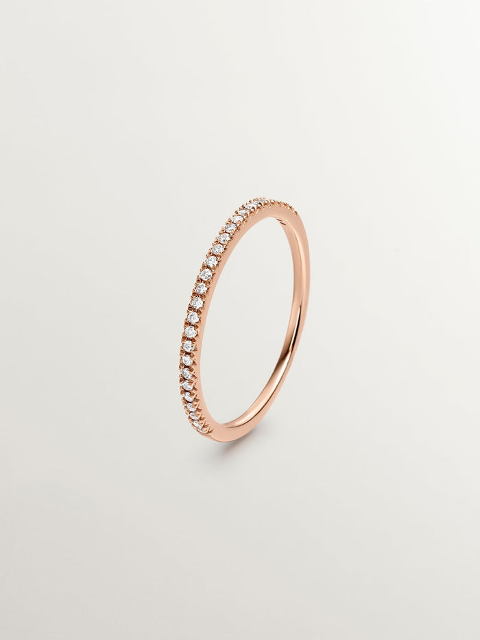 Anillo con halo de diamantes en oro rosa de 0,09 ct