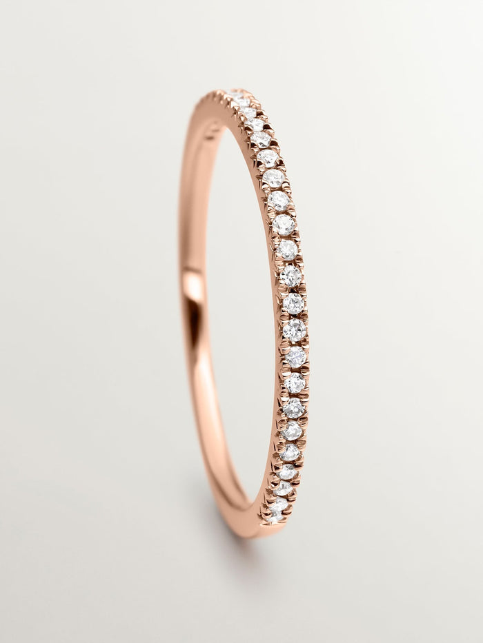 Anillo con halo de diamantes en oro rosa de 0,09 ct