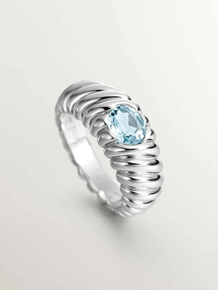 Anillo gallonado de plata 925 con topacio azul sky