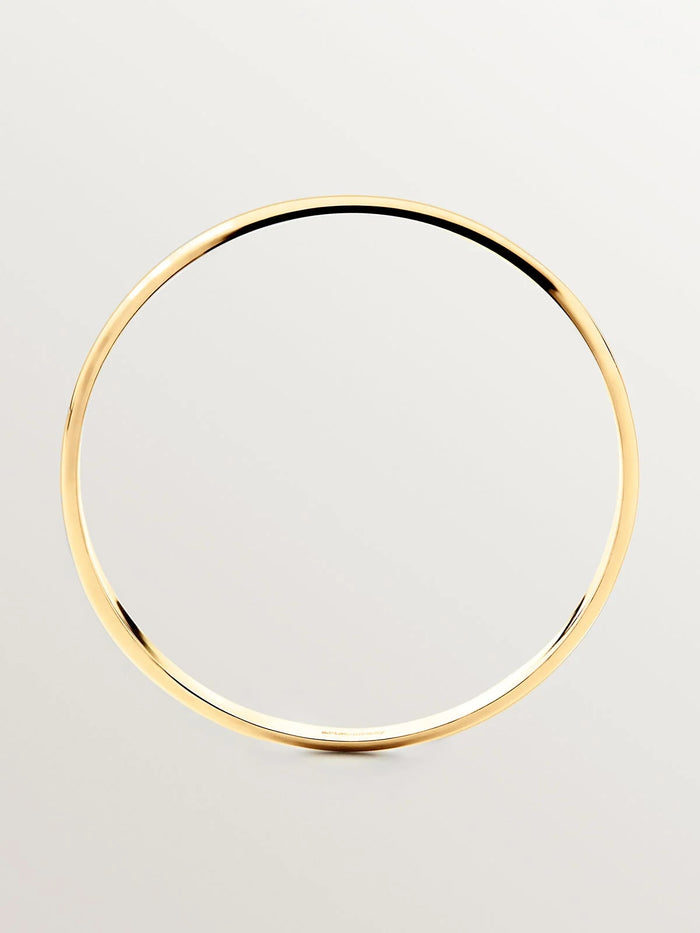 Pulsera rígida estilo semanario de plata 925 bañada en oro amarillo de 18K.