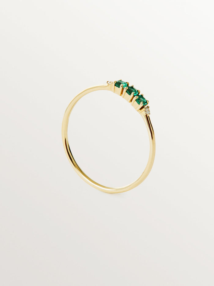 Anillo de oro amarillo de 9K con esmeraldas y diamantes