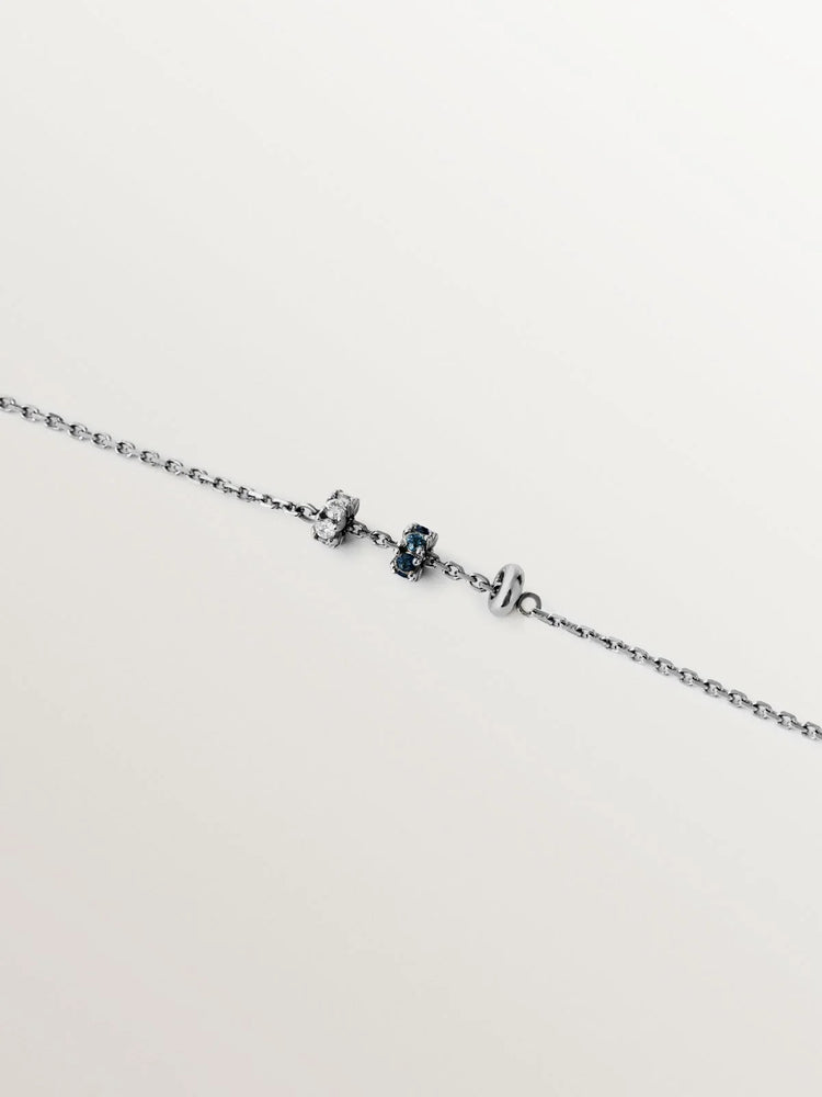 Pulsera de oro blanco de 9K con zafiros azules y diamantes
