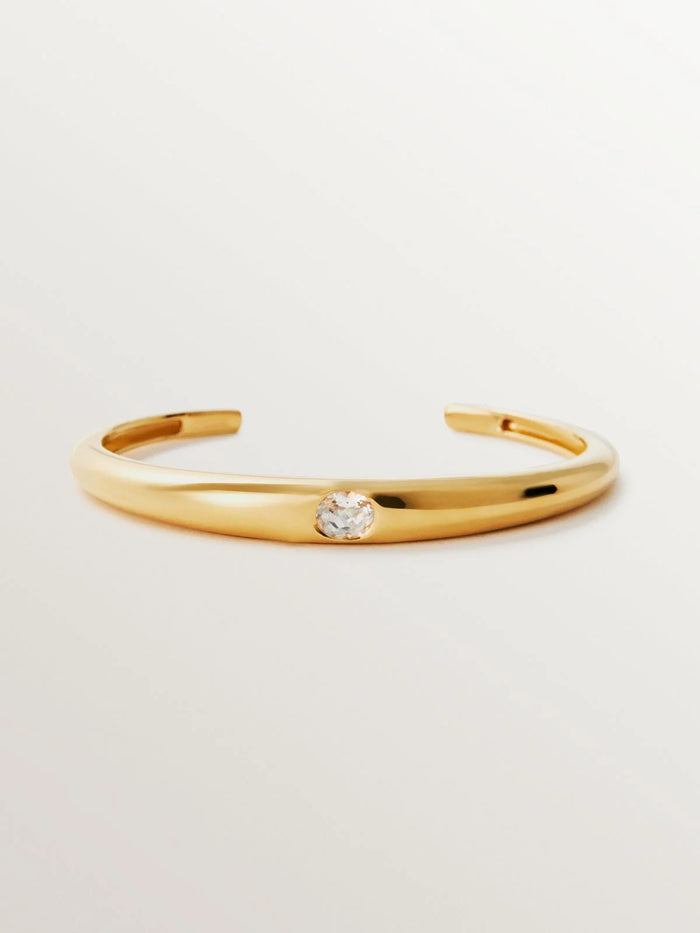 Pulsera rígida de plata 925 bañada en oro amarillo de 18K con topacio blanco