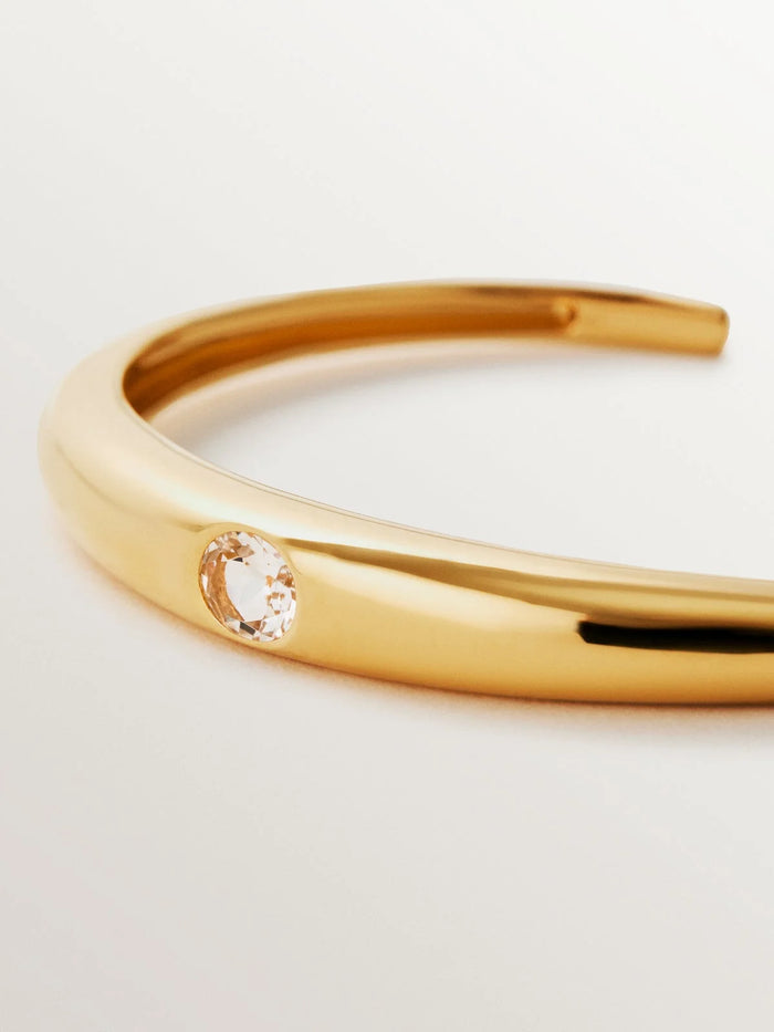 Pulsera rígida de plata 925 bañada en oro amarillo de 18K con topacio blanco