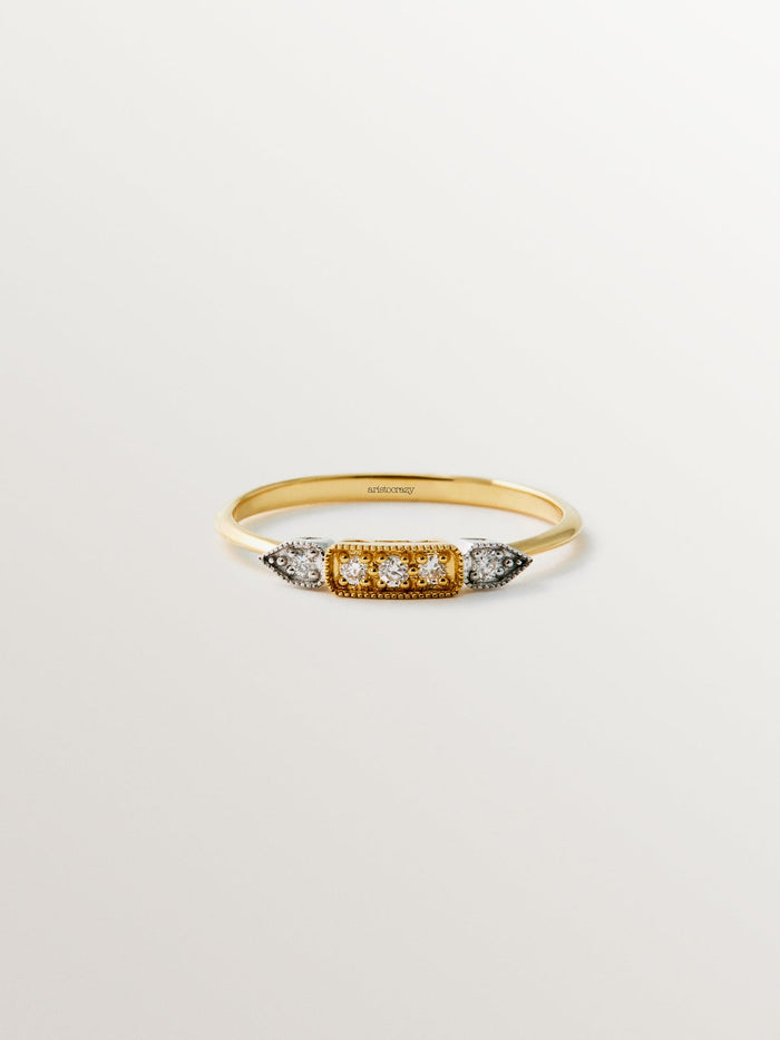 Anillo de oro blanco y amarillo de 18K con pavé de diamantes en talla brillante