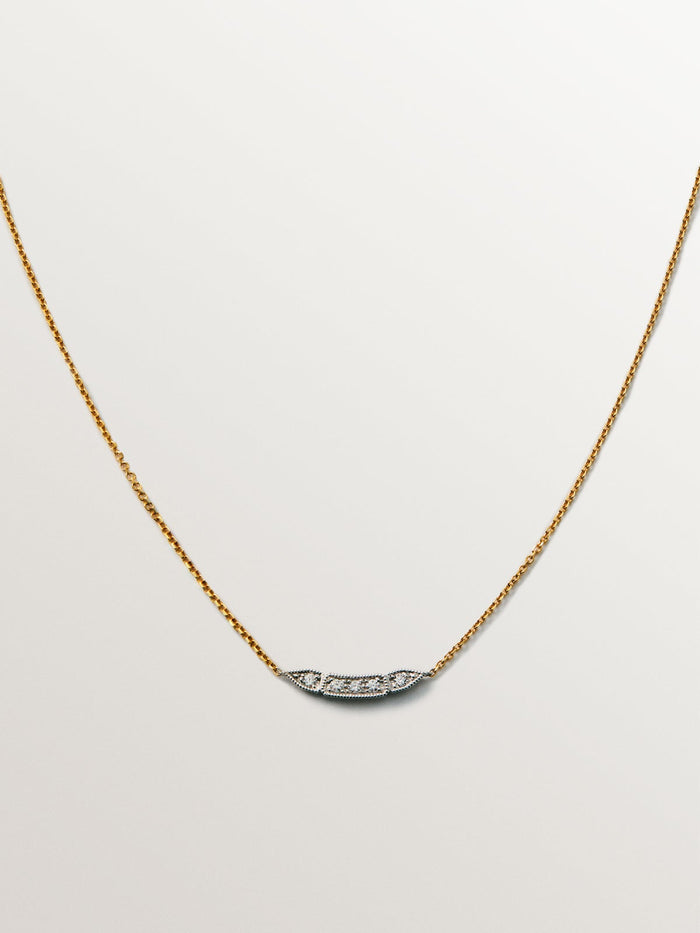 Colgante de oro blanco y amarillo de 18K con pavé de diamantes en talla brillante
