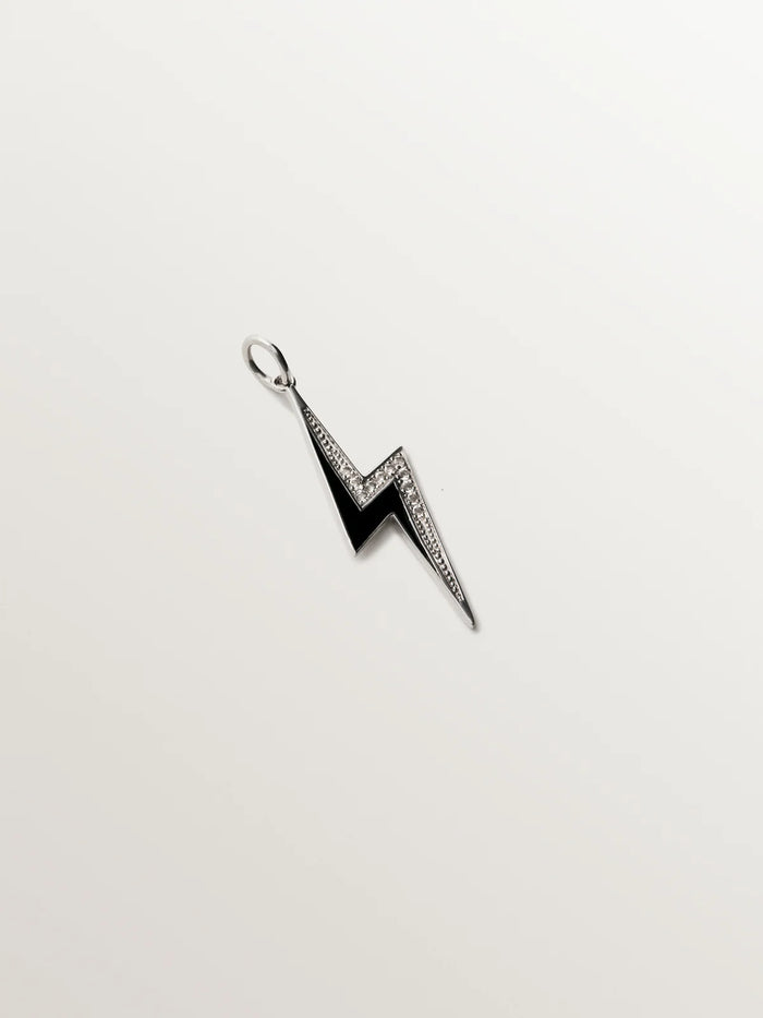 Charm de plata 925 con topacios blancos y detalle en esmalte negro con forma de rayo
