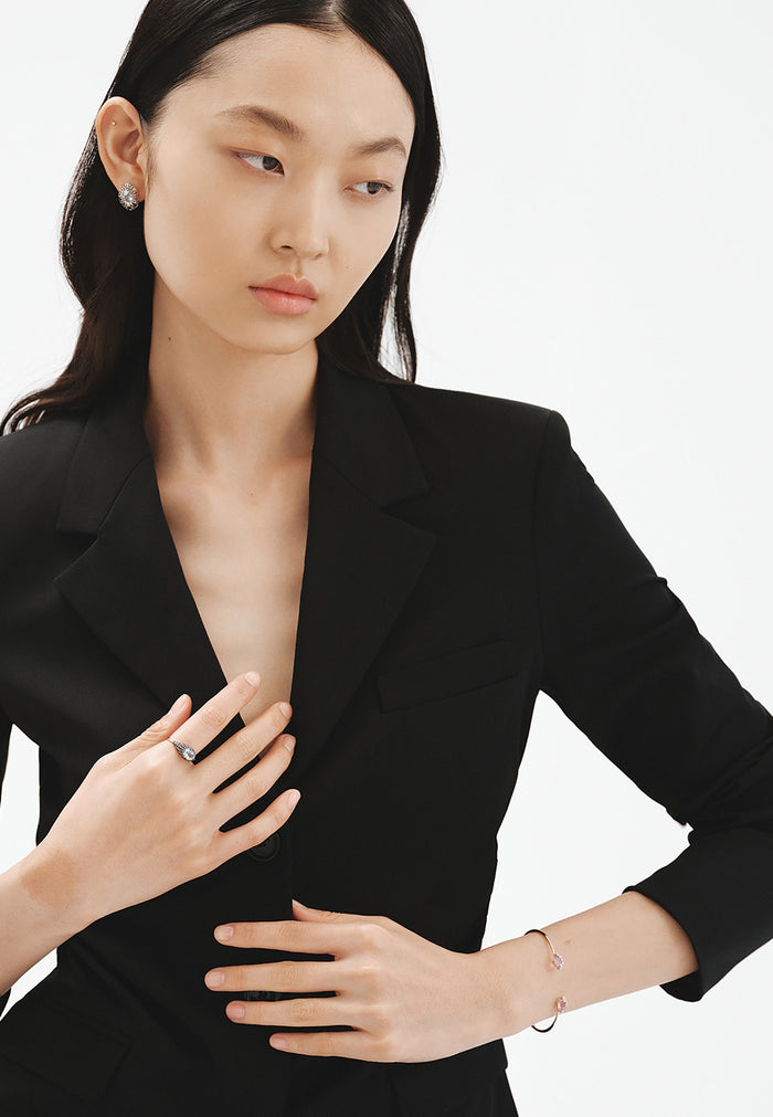 Pulsera abierta de oro amarillo de 9K con amatistas rosas y diamantes